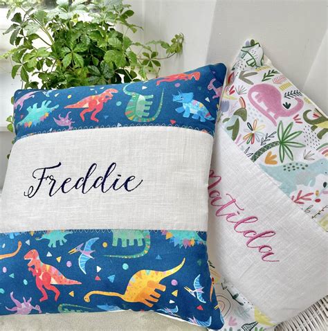 Colourful Dinosaur Name Cushion By Tuppenny House Designs