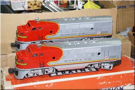 A Vintage Lionel Train Set Including Two Santa Fe 2343t Diesel Engines