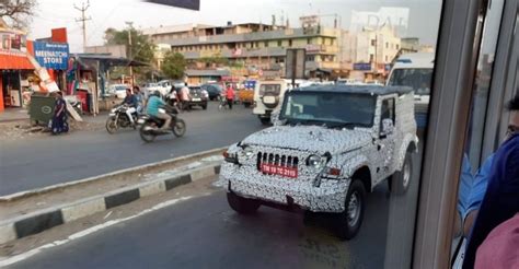 Mahindra's next generation Thar off road SUV spied testing with a ...