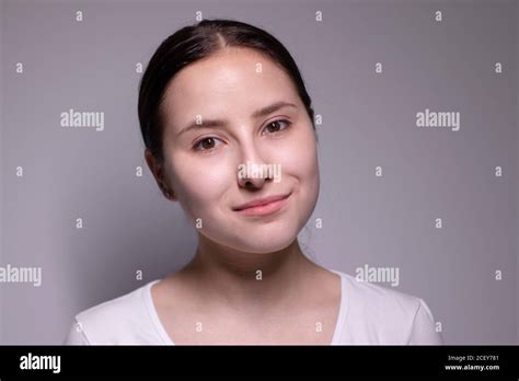 Indoor Portrait Of Beautiful Smiling Brunette With Clean Skin Natural