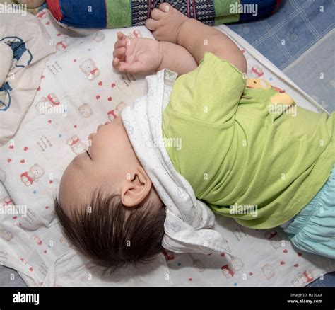 Asian Baby Sleeping And Drinking Milk From The Bottle Stock Photo Alamy