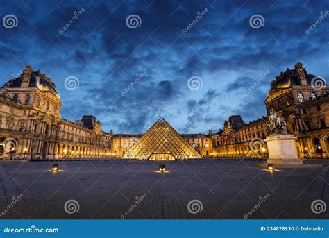 Louvre Museum and the Pyramid Illuminated at Night in Paris France ...