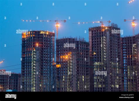 Construction Work On Building At Night Stock Photo Alamy