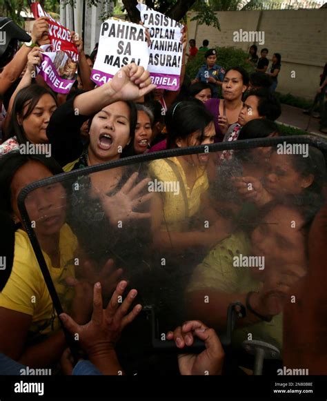 Protesters Are Pushed Back By Police After Breaking Through Security