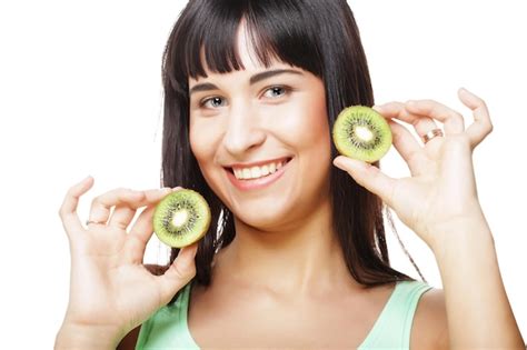 Premium Photo Happy Woman Holding Kiwi