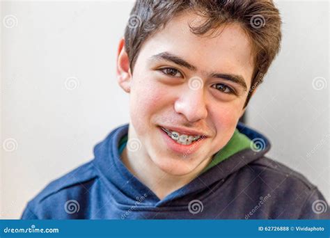 Boy smiling with braces stock photo. Image of student - 62726888