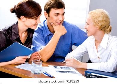 Group Three Successful Business People Discuss Stock Photo 9192253