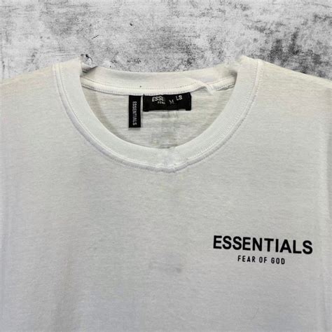 Kaos Essentials Fear Of God Fog Putih Fesyen Pria Pakaian Atasan Di Carousell