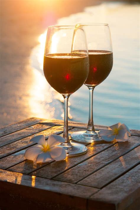 Romantic Outdoor Scene Two Glasses Of Red Wine At Sea Sunset Stock Image Image Of Holiday