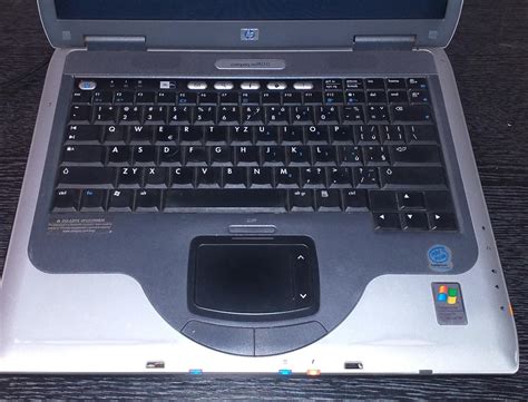 Starý notebook HP Compaq nx9010 štítek Windows XP Aukro