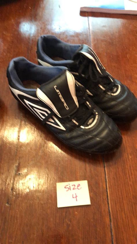 Selling three pairs of gently used boys/unisex soccer cleats Sizes are ...