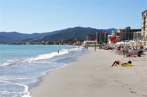 Sandy Beach And Sunbathers Savona Liguria Italy Editorial