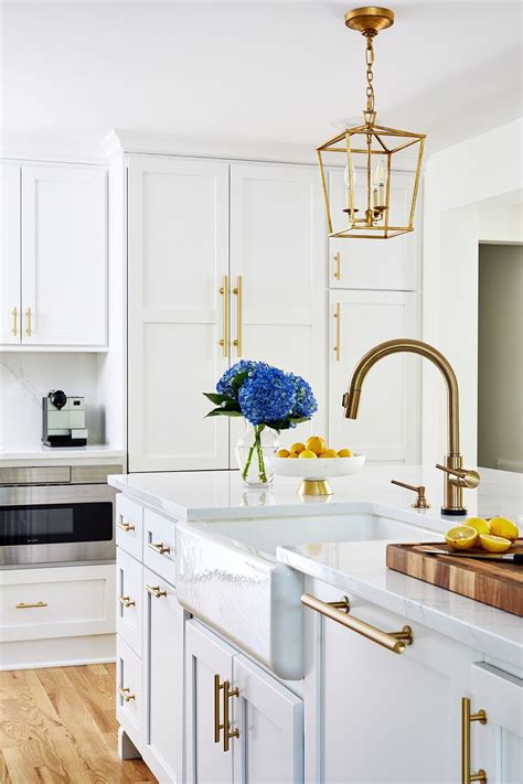 Transitional Painted White Kitchen With Gold Accents Crystal Cabinets