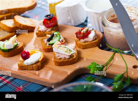 Set Of Various Mini Appetizers With Vegetable Cheese And Meat Pate
