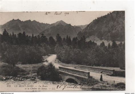 Le Mont Dore Cpa 63 Le Mont Dore La Route Et La Chaine Du Sancy 1914