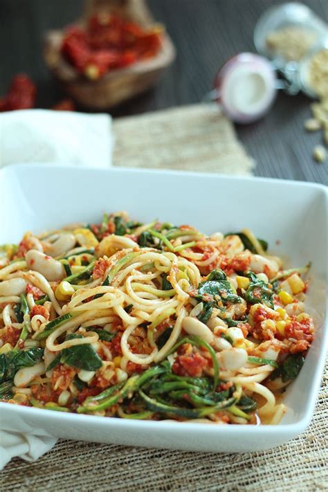 Sun Dried Tomato Pesto Zucchini Pasta With Spinach Beans And Corn Inspiralized Healthy