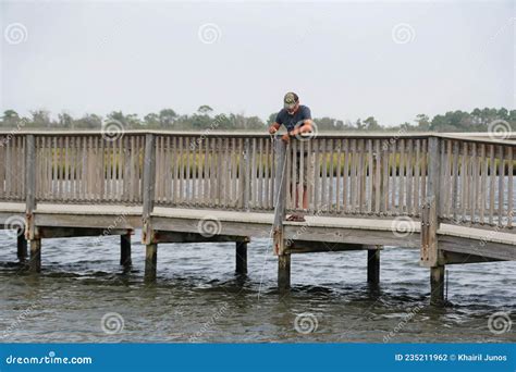 Assateague Island Maryland U S A September 21 2021 A Man Crabbing Using A Line On Top Of