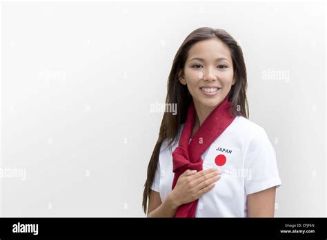 Young woman supporting the Japan women's national football team Stock ...