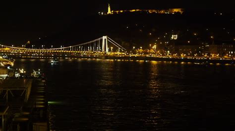 Premium Stock Video Illuminated Bridge And River Danube At Night In