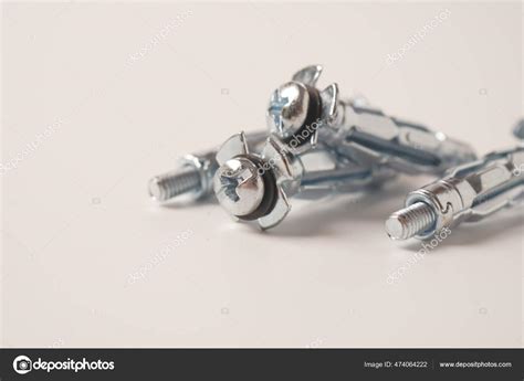 Zinc Plated Steel Molly Bolts Four Molly Metal Dowels Designed Stock Photo by ©Nataly1973 474064222