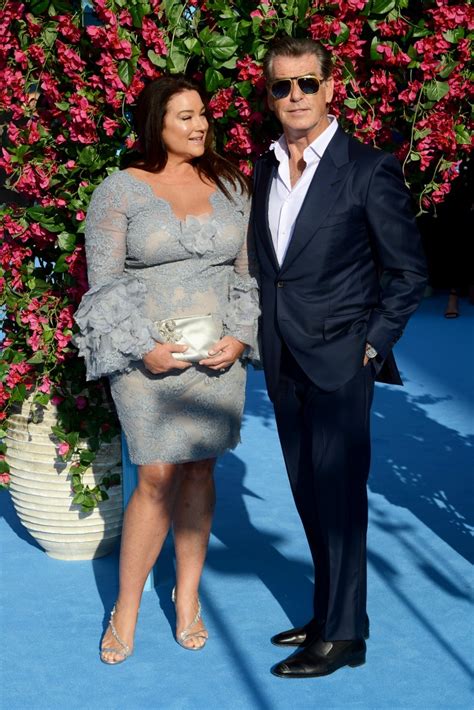 Pierce Brosnan’s glam wife steals the spotlight at Mamma Mia premier ...