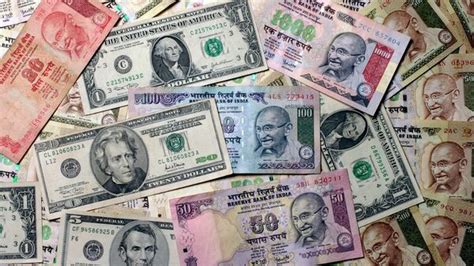 Rupee Opens Flat On Wednesday At Against Us Dollar Stock