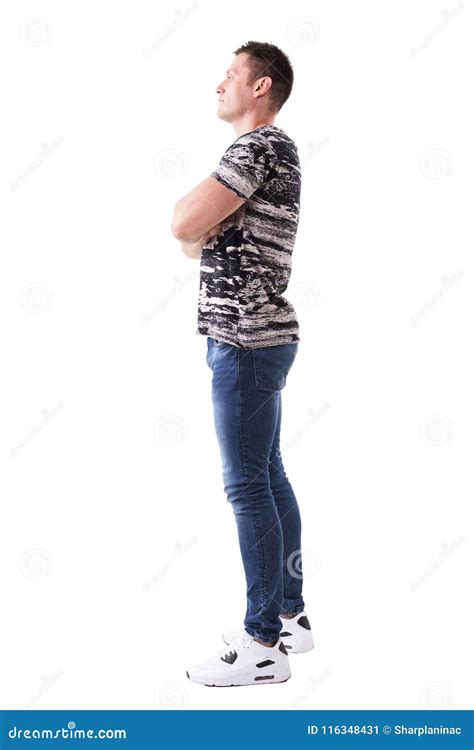 Side View Of Confident Proud Young Casual Adult Man With Crossed Arms