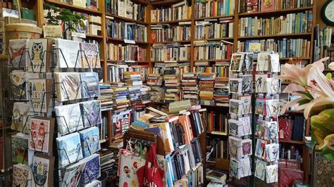 A Room Filled With Lots Of Books And Pictures