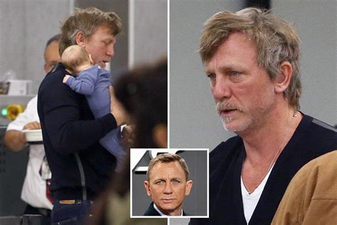 Daniel Craig Looks Very Different From Suave James Bond As He Cradles