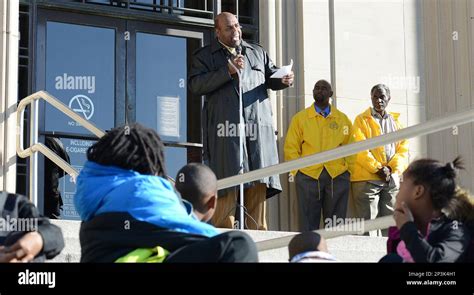 Rev. John Flowers addresses the crowd outside the Lenoir County ...