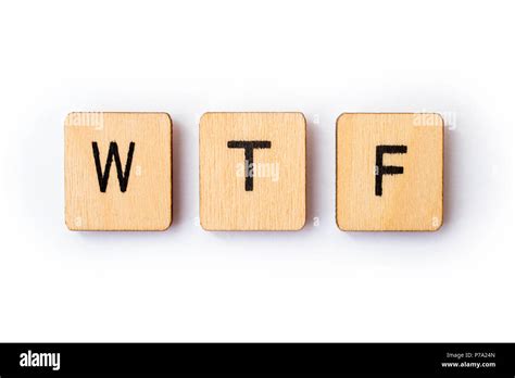 The Abbreviation Wtf Spelt With Wooden Letter Tiles Stock Photo Alamy