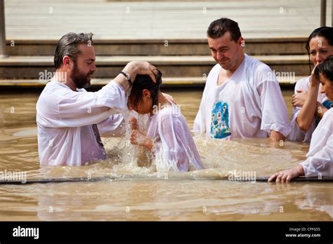 Russian Orthodox Christian Baptism On The Israeli Bank Of The River Jordan From Bethany Beyond