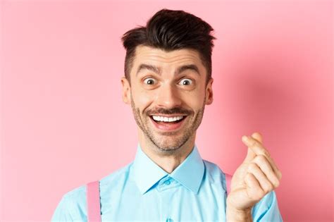 Premium Photo Valentines Day Concept Smiling Man Showing Finger