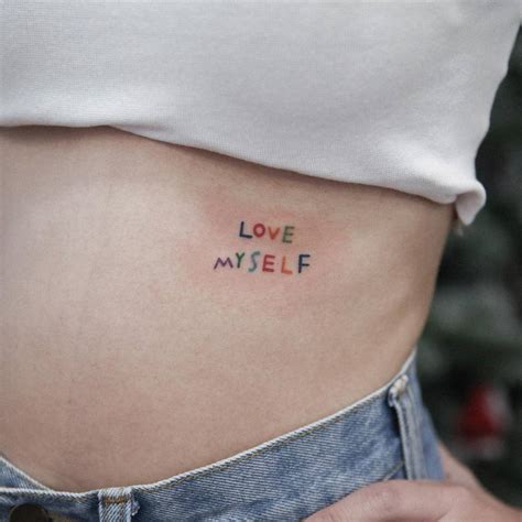 Colorful Lettering Tattoo That Says Love Myself Done