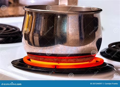 Cooking Pot On Top Of Hot Stove Top Burner Stock Image Image Of Home