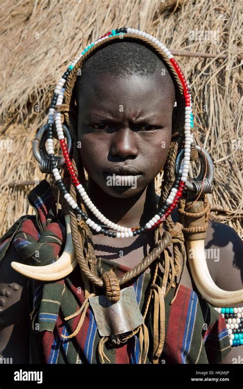 Mursi tribe people in traditional clothing, Mursi Village, South Omo, Ethiopia Stock Photo - Alamy