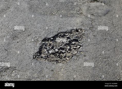 Potholes On The Road Stock Photo Alamy