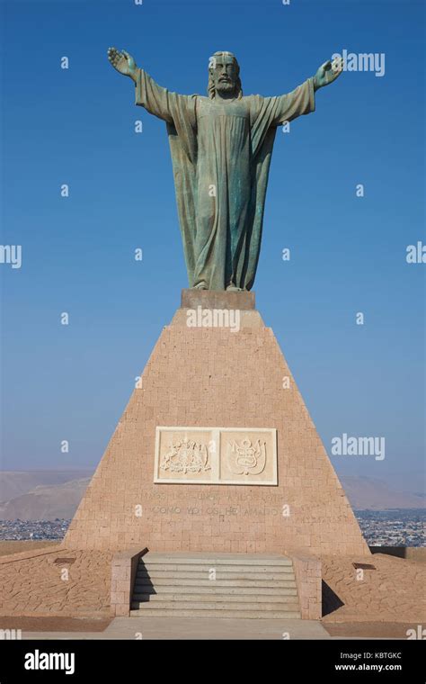 Statue Of Christ On The Top Of The Morro De Arica A Cliff That Towers