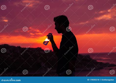Silhouette Man Is Drinking Water Bottle On Hot Weather Background With Summer Season High