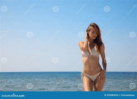 Attractive Woman With Perfect Body In Bikini Near Sea Stock Photo