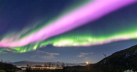 Solar Storm Causes Neon-Pink Northern Lights to Fill the Sky