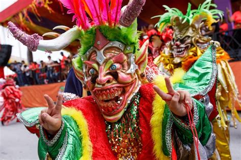 Premium Photo A Man In A Carnival Costume And Mask