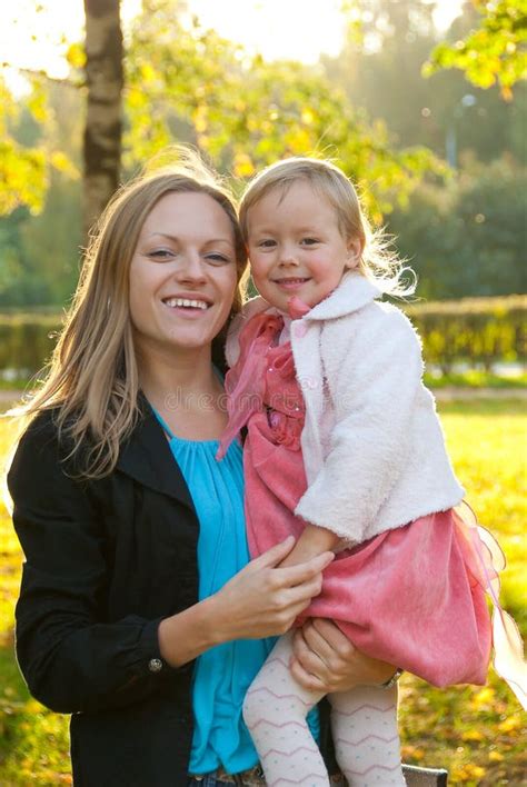 Happy mother and daughter stock photo. Image of outside - 13319582