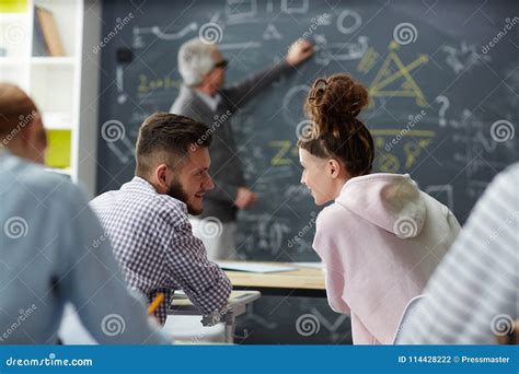 Talk at lesson stock photo. Image of couple, learner - 114428222