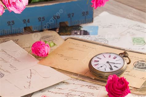 Old Pile Of Mail And Antique Clock On Wooden Table Photo Background And