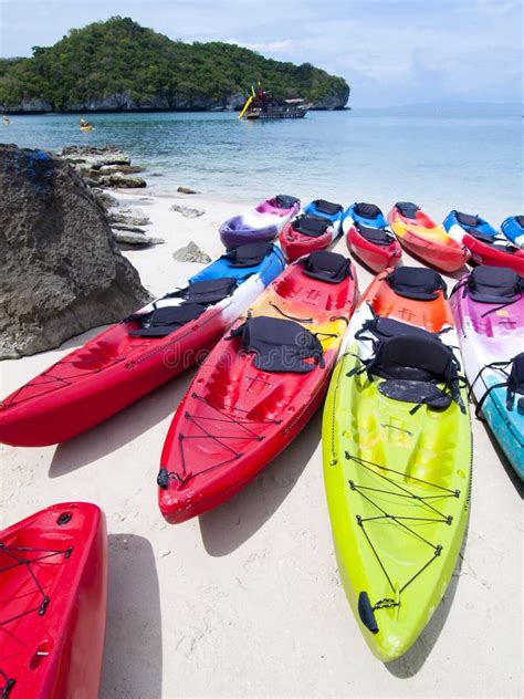 Colorful Kayak On The Tropical Crystal Clear Water Beach Stock Photo