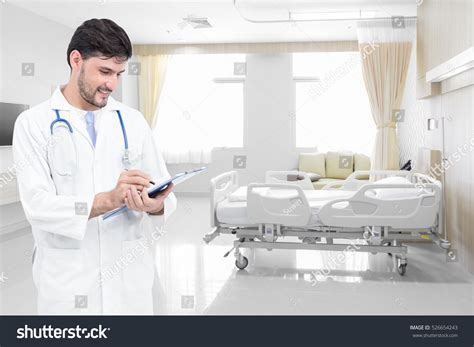 Doctor Writing Medical Records Modern Hospital Stock Photo 526654243