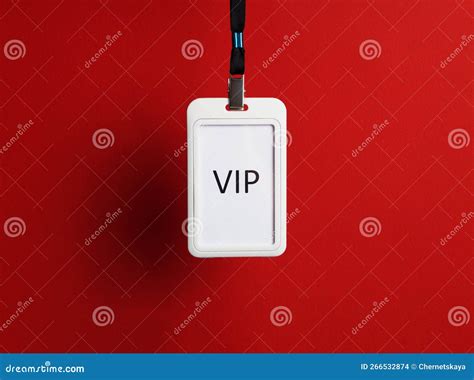 White Plastic Vip Badge Hanging On Red Background Stock Photo Image