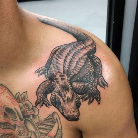 Little black and white realistic looking alligator tattoo on shoulder ...