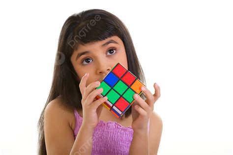 Girl Holding A Rubiks Cube Photo Background And Picture For Free